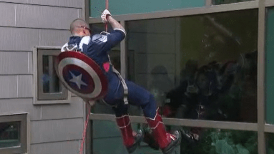 Superheroes Unite: APD Officers and Healthcare Workers Rappel Down Dell Children's Hospital