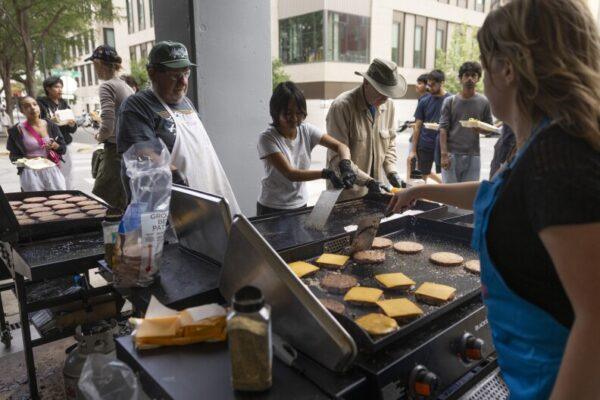 Austin Church Distributes Hundreds of Free Burgers Weekly Near UT Campus to Fight Food Insecurity