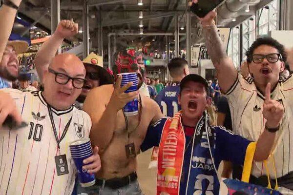 "Electric Atmosphere: Dutch and Japanese Fans Celebrate World Cup Draw at Dallas Stadium"
