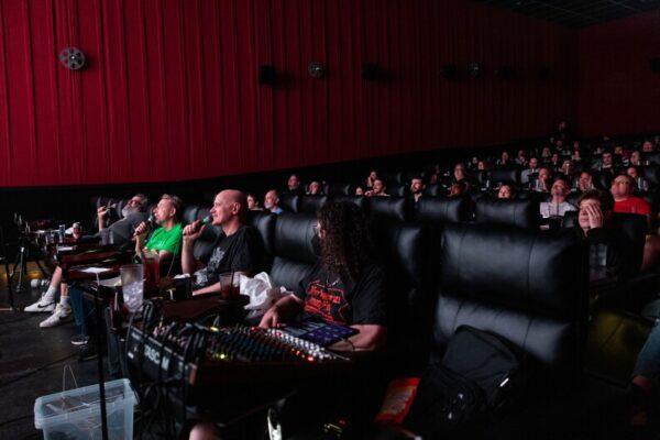 John Erler, Scott Chester, and Chris Cubas tell jokes during the Master Pancake showing of Birdemic on Saturday, Sept. 13, 2025, at Alamo Drafthouse Cinema Village in Austin.