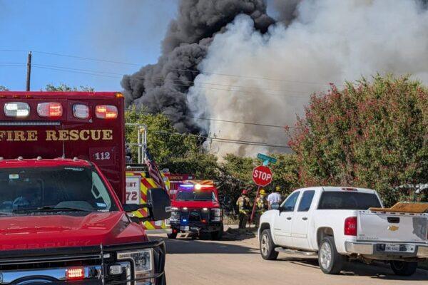 Massive Dallas Grass Fire Engulfs Home and Tires, Creating Dense Smoke Plume