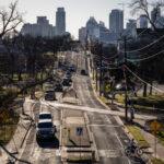 Commuters drive along Rosewood Avenue, as pictured from Pleasant Valley Road, on Tuesday, Feb. 25, 2025, in East Austin.