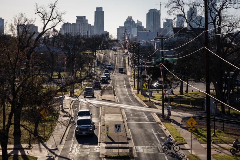 Commuters drive along Rosewood Avenue, as pictured from Pleasant Valley Road, on Tuesday, Feb. 25, 2025, in East Austin.
